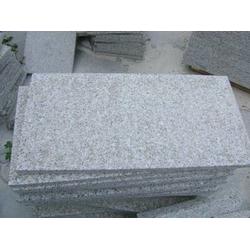 五蓮紅花崗巖火燒板 石材加工廠的專業(yè)工藝解析